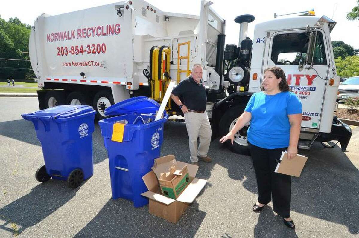 Hour Photo/Alex von Kleydorff Waste Program Manager for the City of Norwalk Jessica palladino along with Bryan Ayers, Safety Manager with City Carting, talk about the city's Recycling project