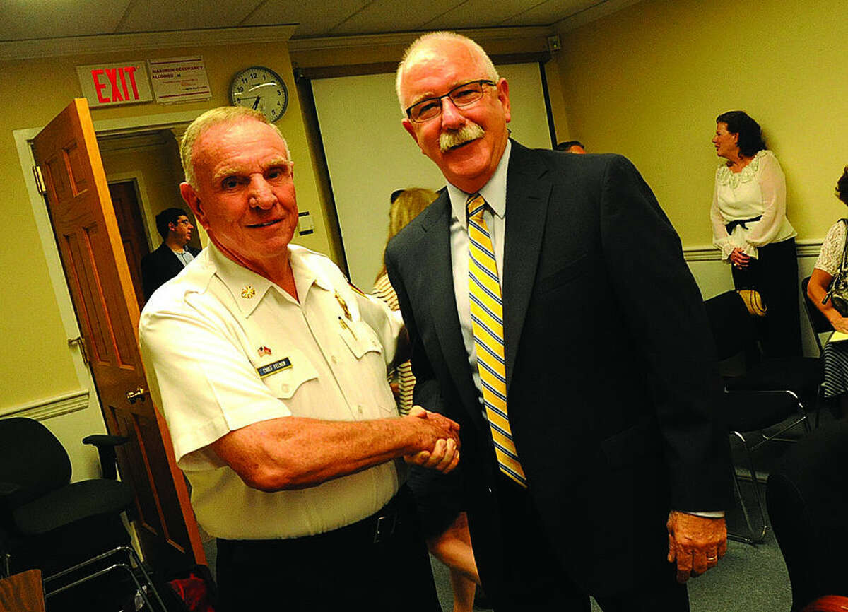 Fairfield Fire Chief Richard Felner with Denis McCarthy at the Fairfield Fire Commision meeting. McCarthy was appointed to replace Felner Monday night. Hour photo/Matthew Vinci