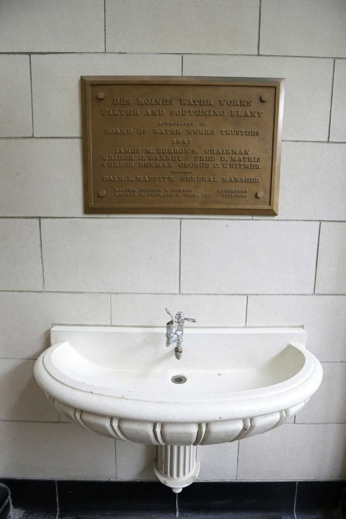 This Wednesday, July 15, 2015 photo shows an old drinking fountain at the Des Moines Water Works plant in Des Moines, Iowa. "We're reaching the end of the life cycle of some of the most critical assets we've got," says Bill Stowe, CEO and general manager of the utility, where the downtown treatment plant was built in the 1940s. (AP Photo/Charlie Neibergall)