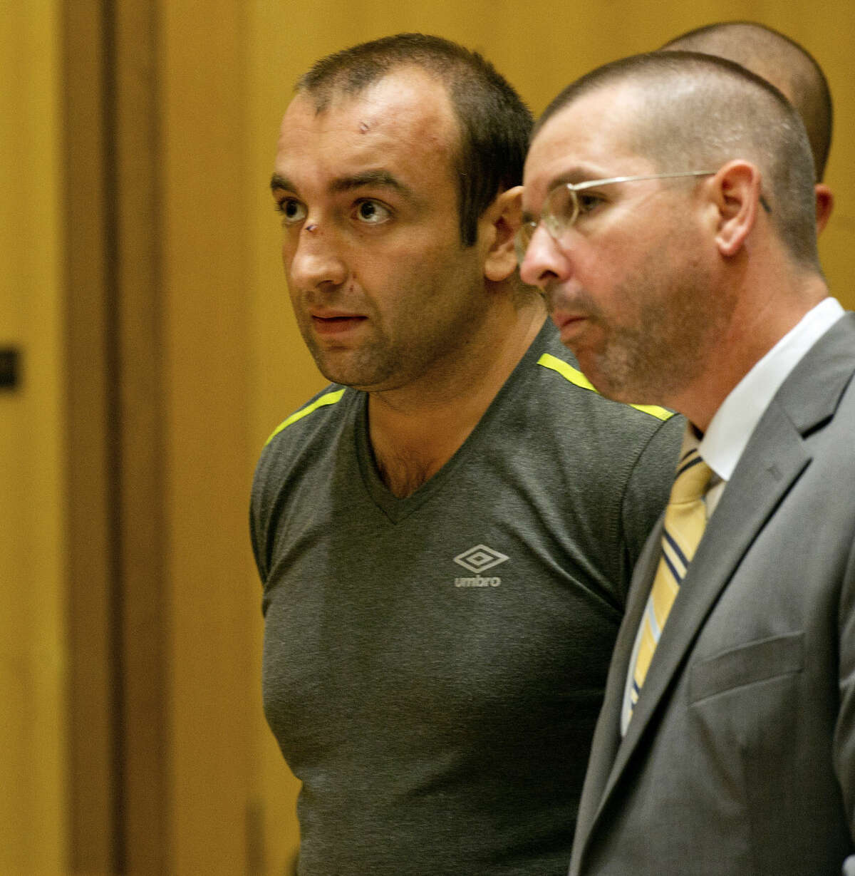 Shota Mekoshvili, with his attorney Lindy Urso in State Superior Court in Stamford, Conn., on Friday, August 29, 2014. Mekoshvili is accused of murdering Mohammed Kamal, the Stamford Taxi driver found near his cab on Doolittle Road earlier this week.(Mandatory Credit - Lindsay Perry/Stamford Advocate)