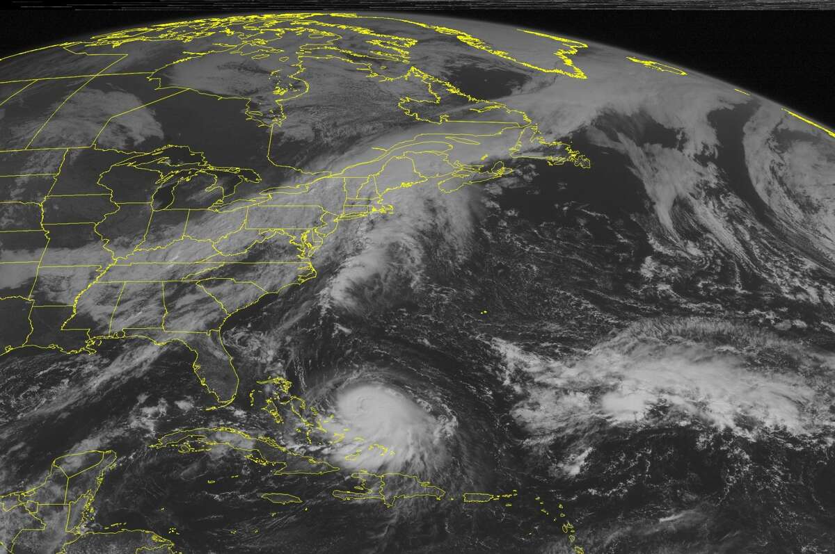 This NOAA satellite image taken Wednesday, Sept. 30, 2015, at 9:45 AM EDT shows a cold front stretching from the Northeast into the central US. A long the front is a developing low pressure over New England. This is producing heavy rain and thunderstorms. Behind the storm system is an are of high pressure, producing clear skies for the Northern Plains. In the Caribbean region is Hurricane Joaquin. The storm is expected to start heading north and could possibly effect the east coast later in the week. (Weather Underground via AP)