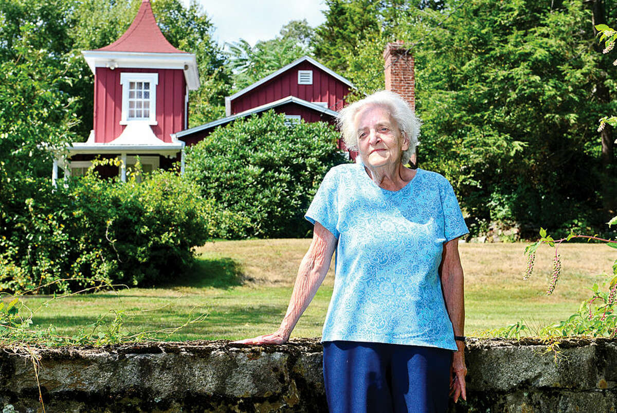 Hour photo / Erik Trautmann Joan Tortora, a descendent of the builder of the house on Al Madany Islamic Center property at 127 Fillow St., believes the house is historical and says it was home to descendents of New England colonist John Cotton Mather.
