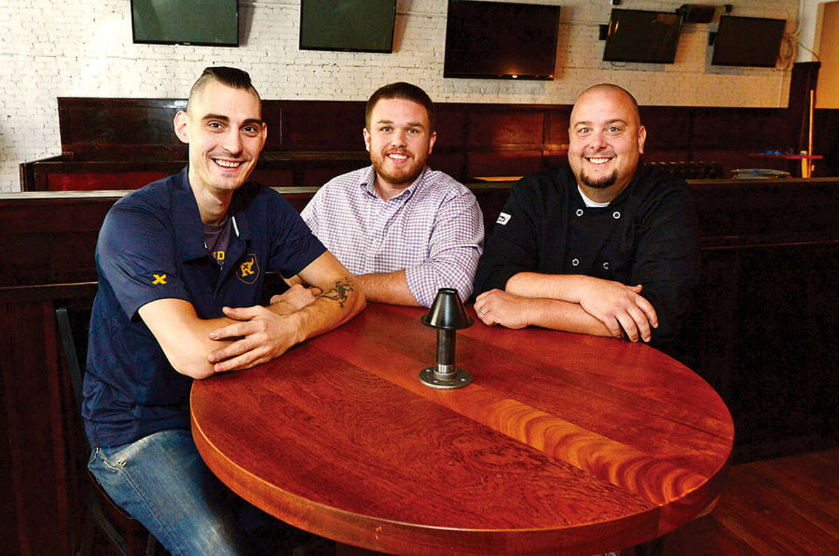 Hour photo / Erik Trautmann Owners, Matt Bacco, Casey Dohme and Jamie Pantanella wil be opening a new sports bar, Blind Rhino, on North Main St in SoNo next Friday