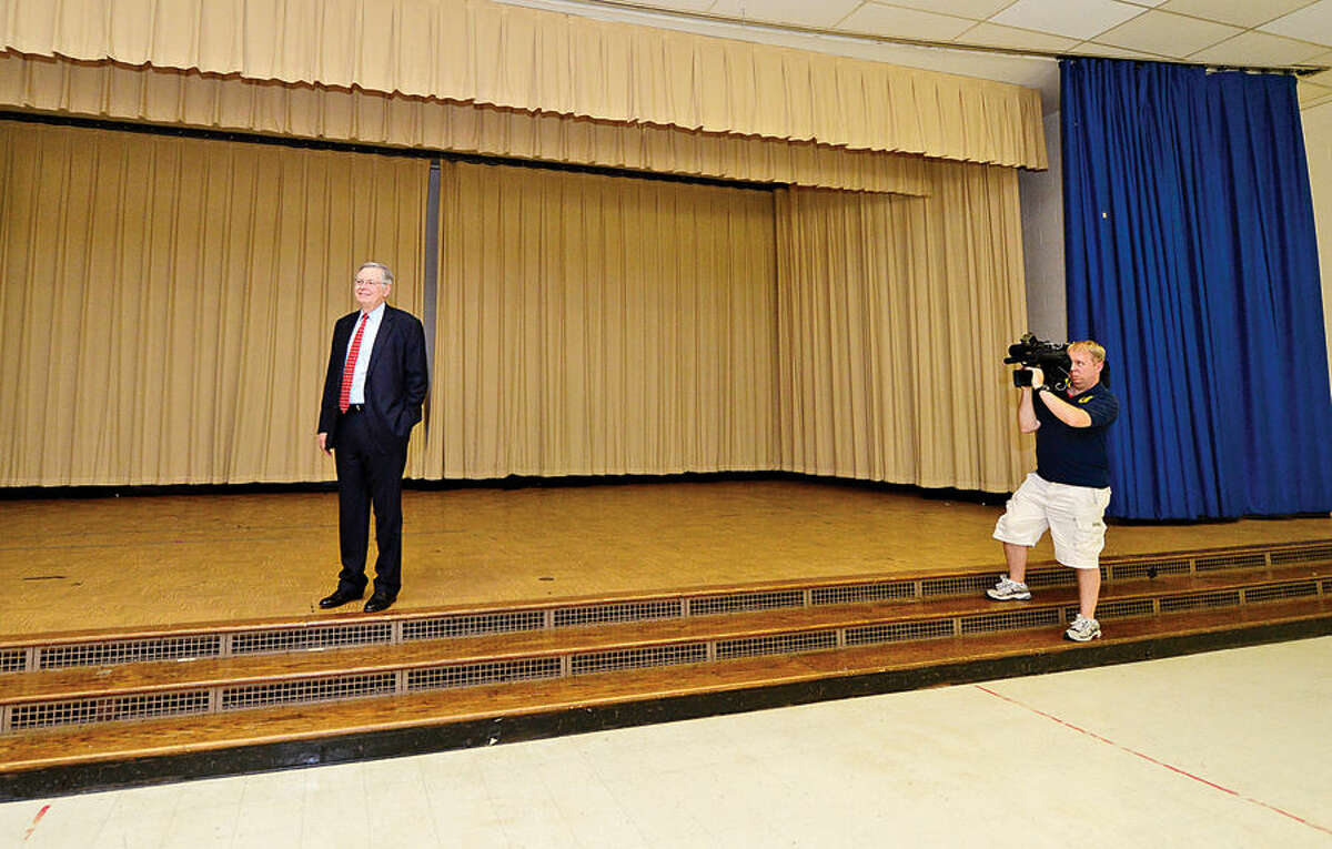 Hour photo / Erik Trautmann Stamford Mayor David Martin tours the former Sacred Heart Academy following a presentation of the keys ceremony at the former Academy which the city purchased Thursday.