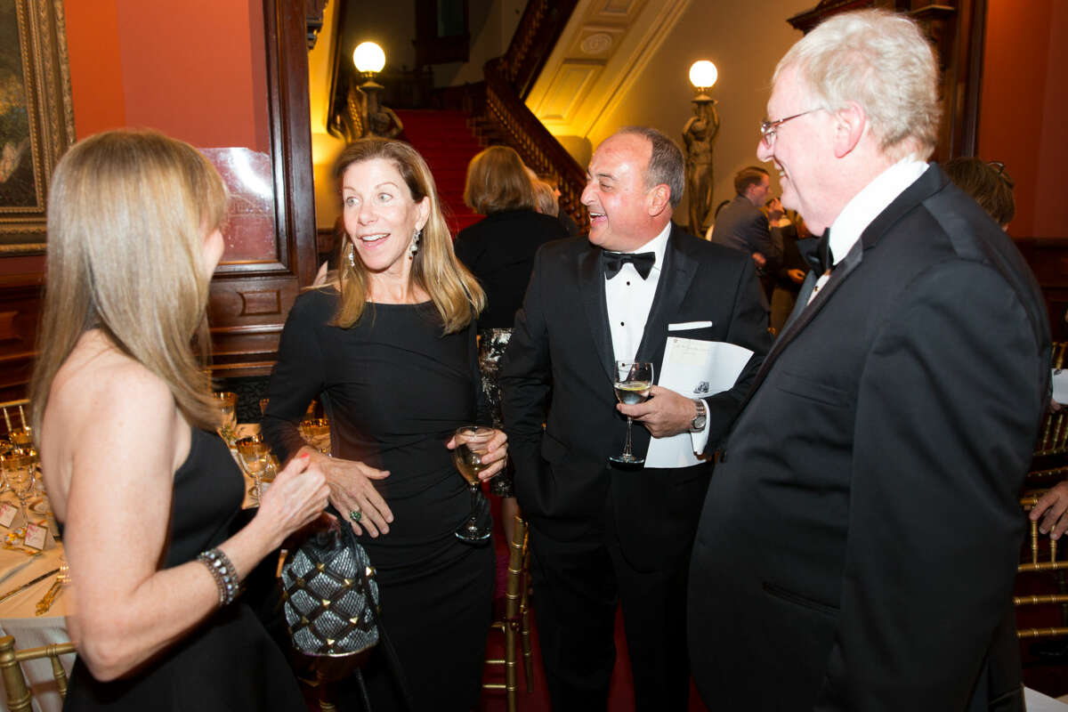 Hour photo/Chris Palermo Chris Bradley and Larry Cafero mingle with guests at the Lockwood Mathews Mansion Gala Saturday night. at the Lockwood Mathews Mansion Gala Saturday night.