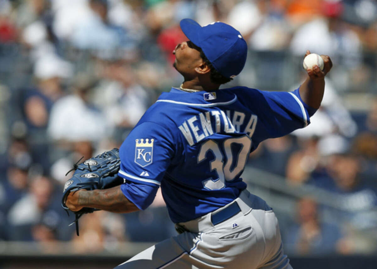 Kansas City Royals starting pitcher Yordano Ventura (30) delivers in the first inning of a baseball game against the New York Yankees at Yankee Stadium in New York, Sunday, Sept. 7, 2014. (AP Photo/Kathy Willens)