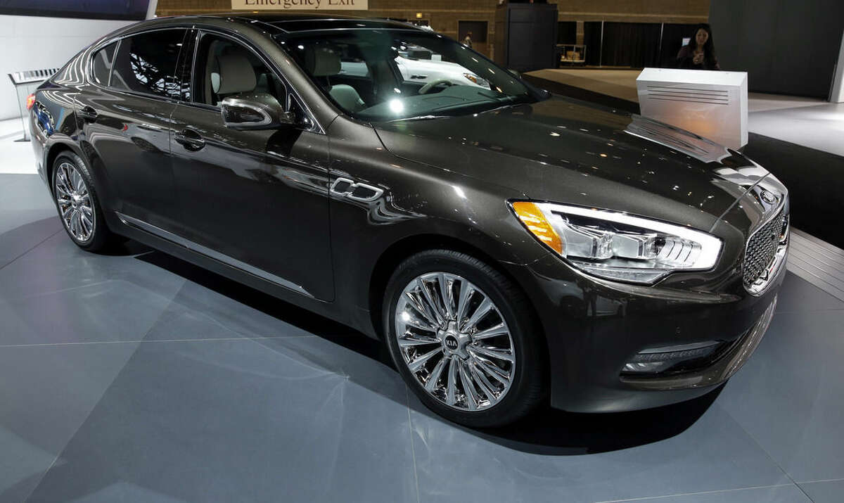 FILE - In this Feb. 7, 2014 file photo, a Kia 2015 K900, V8 is displayed during the media preview of the Chicago Auto Show at McCormick Place in Chicago. The K900 is an attractive, large, luxury sedan with a quiet, comfortable ride, a boatload of standard features and a value price compared with luxury-brand competitors. (AP photo/Nam Y. Huh, File)