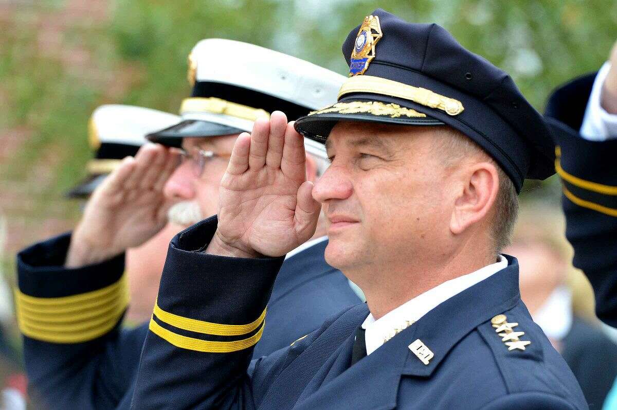 Hour Photo/Alex von Kleydorff Police Chief Tom Kulhawick and Fire Chief Denis McCarthy during Norwalk Remembers , 9-11 Rememberance Ceremony at City Hall