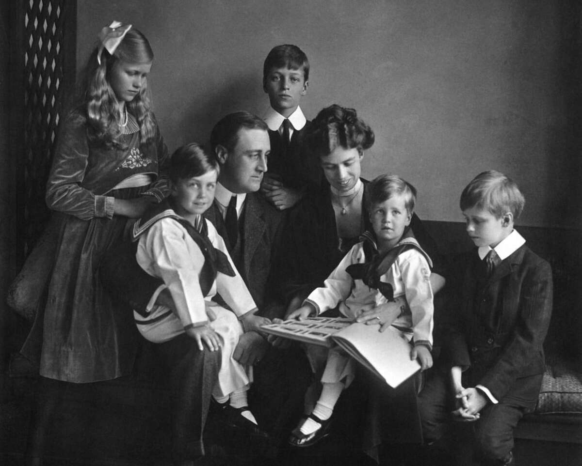 In this June 12, 1919 photo provided by PBS, Franklin and Eleanor Roosevelt pose for a portrait with their children in Washington. Documentary filmmaker Ken Burns', "The Roosevelts: An Intimate History," premieres on PBS as a seven-night, 14-hour extravaganza airing Sunday through Saturday (Sept. 14-20) at 8 p.m. EDT. (AP Photo/PBS, Franklin D. Roosevelt Presidential Library, Hyde Park, NY, Daniel J. White)