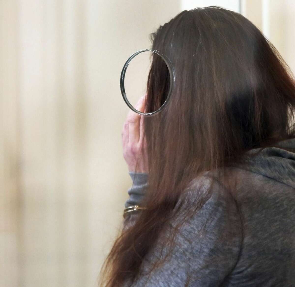Rachelle Bond attends a hearing in Dorchester District Court, on Tuesday, Oct. 20, 2015, in Boston. Bond is charged with being an accessory after the fact in helping to dispose of the body of her daughter, Bella, the girl dubbed Baby Doe. Her boyfriend, Michael McCarthy is charged with murder. (Wendy Maeda/The Boston Globe via AP, Pool)