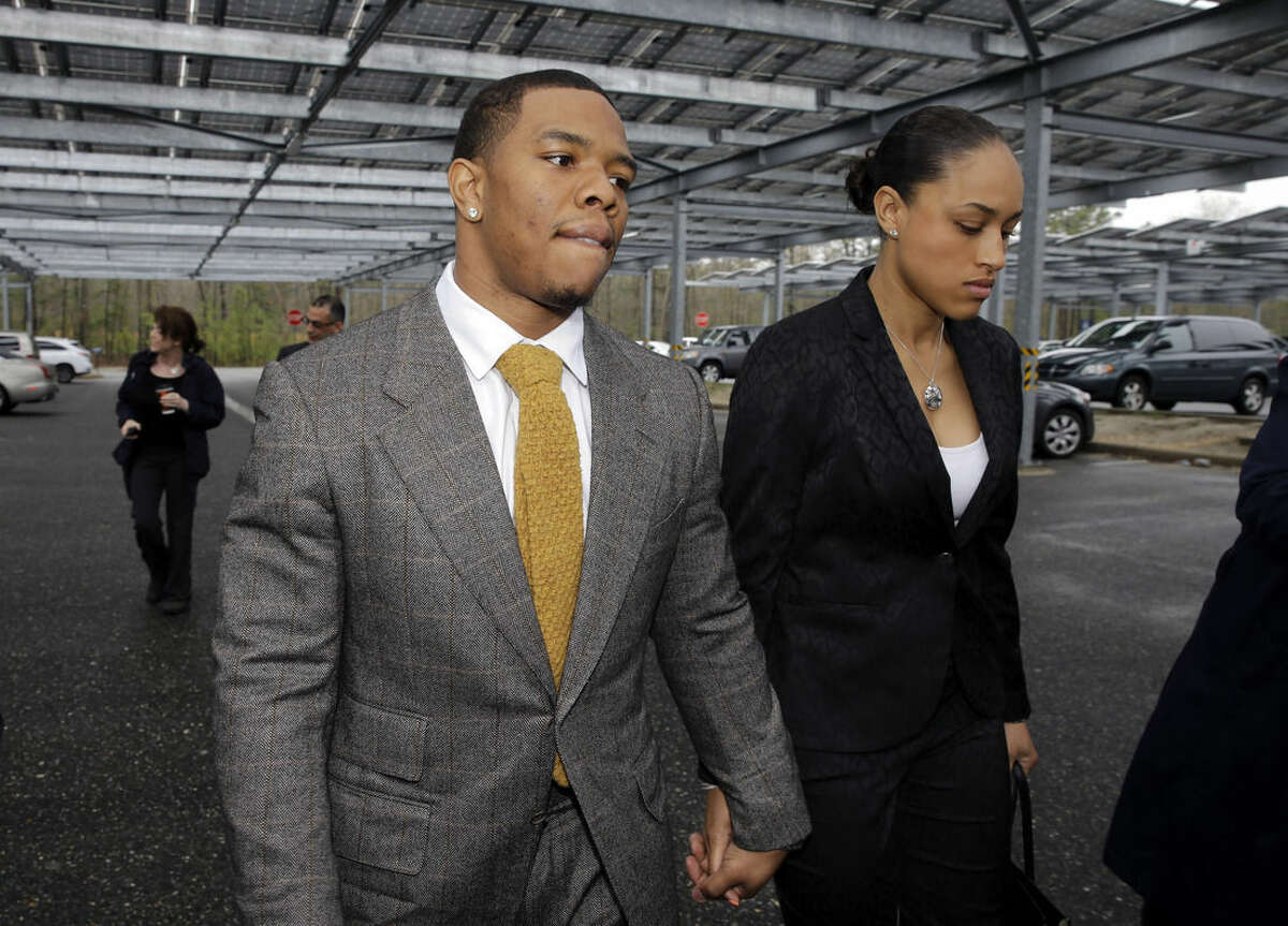 FILE - In this May 1, 2014, file photo, Baltimore Ravens football player Ray Rice holds hands with his wife, Janay, as they arrive at Atlantic County Criminal Courthouse in Mays Landing, N.J. The offender-rehabilitation program that former Raven Rice entered after knocking Janay unconscious in an Atlantic City elevator is rarely used in domestic assault cases. (AP Photo/Mel Evans, File)