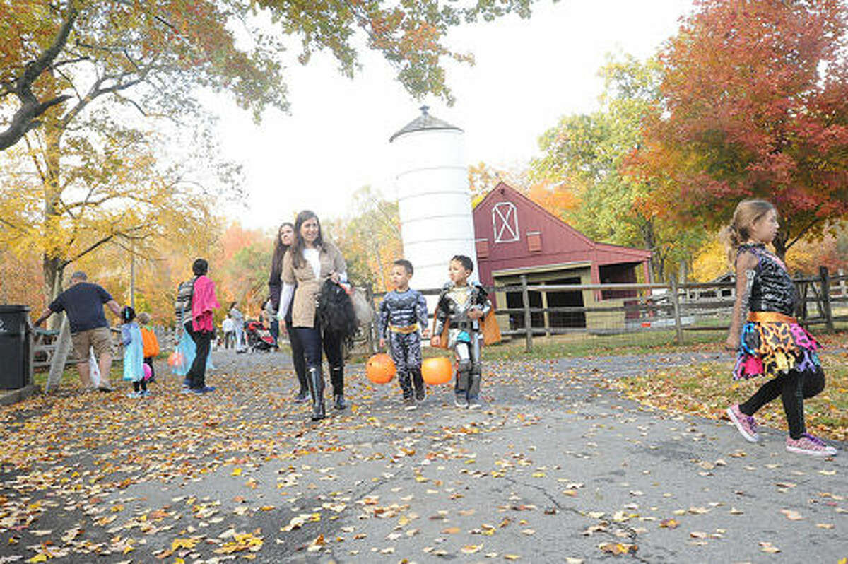 Kids enjoy the "Ick Fest" held at the Stamford Museum and Nature Center. Hour photo Matthew Vinci
