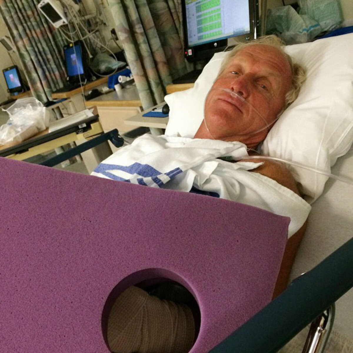 This photo provided by Greg Norman shows Norman resting in a hospital bed after a chainsaw accident. Norman posted a photo to Instagram on Sunday, Sept. 14, 2014, in which he was laying in a hospital bed with his left arm heavily bandaged. The Hall of Fame golfer and entrepreneur, was cutting back trees in his South Florida home when the weight of a branch pulled his left hand toward the chain saw. He said the blade hit him just below where a person would be wearing a wrist watch. He said doctors told him it missed his artery by a fraction of an inch. (AP Photo/Courtesy of Greg Norman) NO SALES