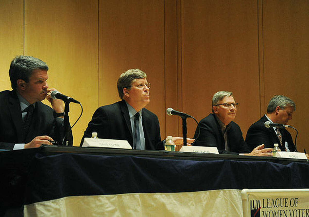 The four candidates for selectman debate Monday at the Wilton Library sponsored by the Wilton League of Women Voters. Photo/Matthew Vinci