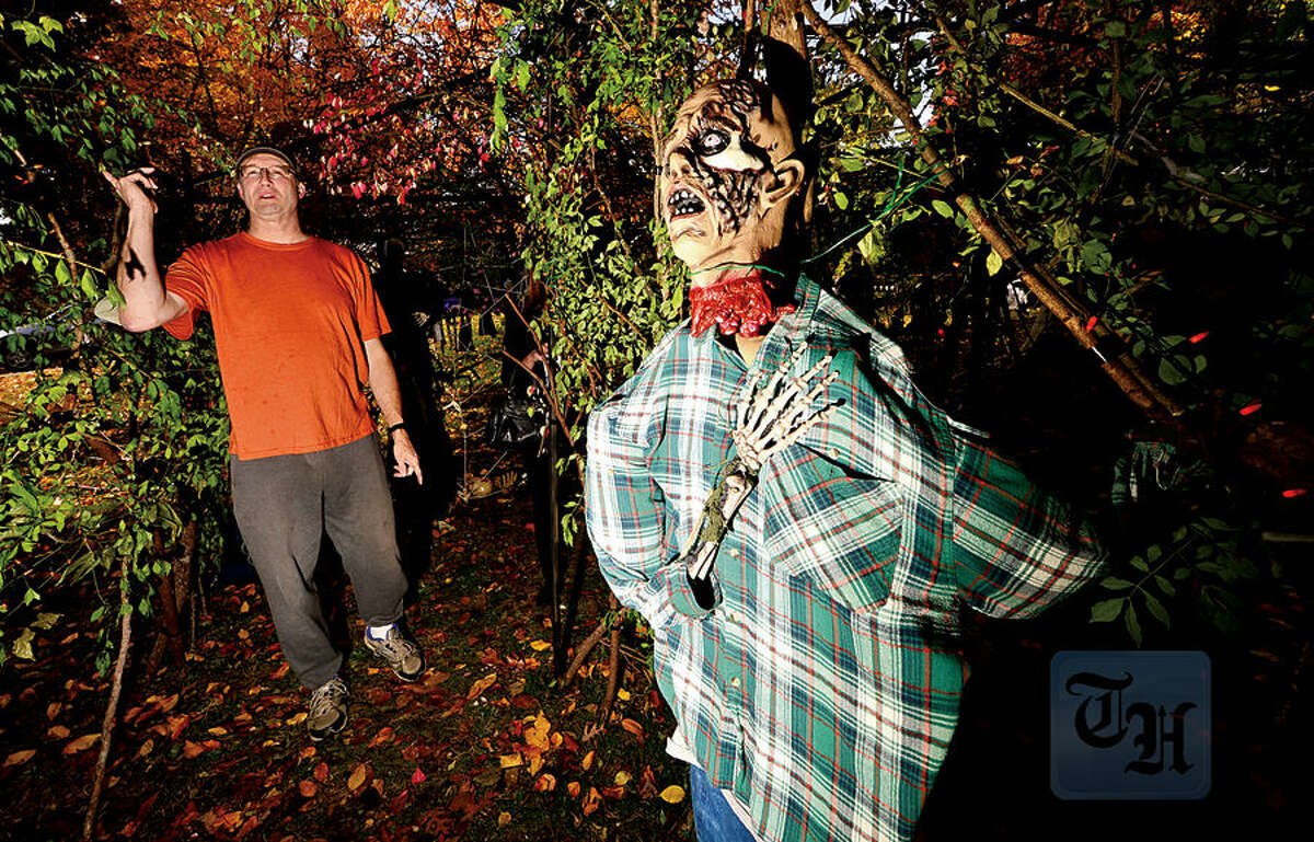 Hour photo / Erik Trautmann Norwalk residents, Jeannie and Bob Lamp, have put up a huge Halloween display in her yard at 4 Ledgewood Court again this year hoping to attract even more Trick-Or-Treaters.