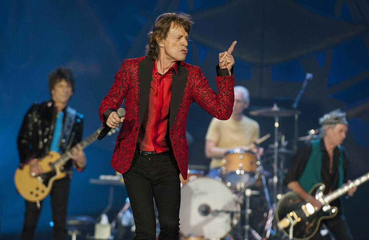 FILE - In this July 4, 2015 file photo, Ronnie Wood, Mick Jagger, Charlie Watts and Keith Richards of the Rolling Stones perform at the Indianapolis Motor Speedway in Indianapolis. On Thursday, Nov. 5, 2015, the band announced “The America Latina Olé” tour, which will kick off Feb. 3 in Santiago, Chile. (Photo by Barry Brecheisen/Invision/AP)