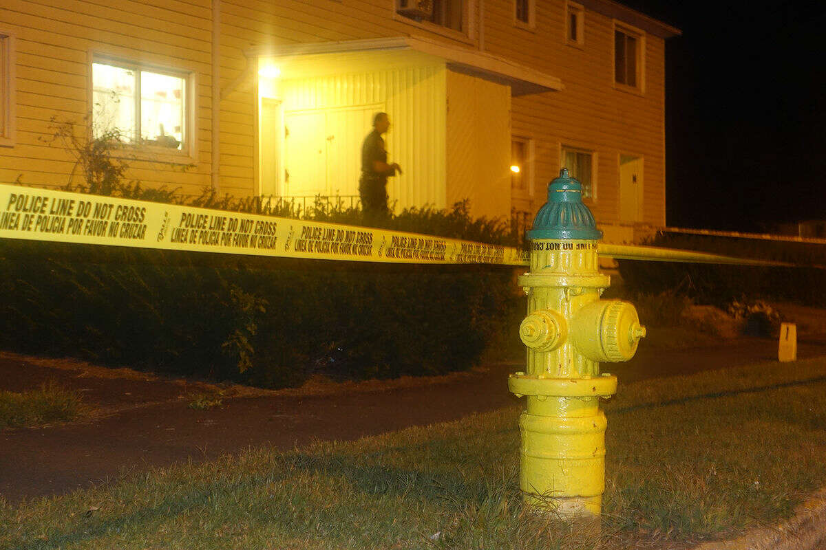 Hour photo/Jeff Dale Norwalk Police investigate a shooting at Colonial Village after a male victim was shot in the leg.