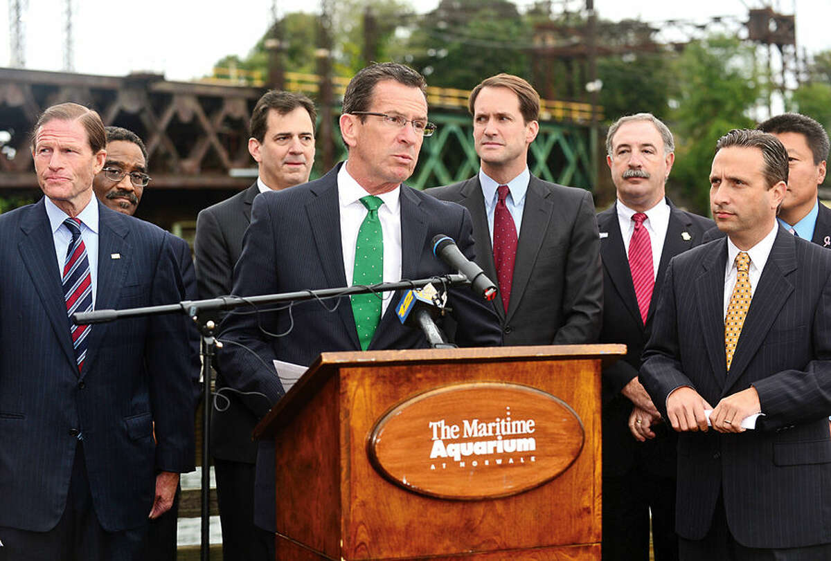 Hour photo / Erik Trautmann Governor Dannel P. Malloy holds a news conference in Norwalk Thursday morning to highlight the planned replacement of the Walk Bridge, the 118-year old bridge that serves on Metro-North’s New Haven Line. U.S. Senator Richard Blumenthal, Congressman Jim Himes, Mayor Harry W. Rilling, State Senator Bob Duff, Department of Transportation Commissioner James P. Redeker, Connecticut Commuter Rail Council Vice Chairman John Hartwell, commuter advocate Jim Cameron, and other local officials joined the governor in the announcement.