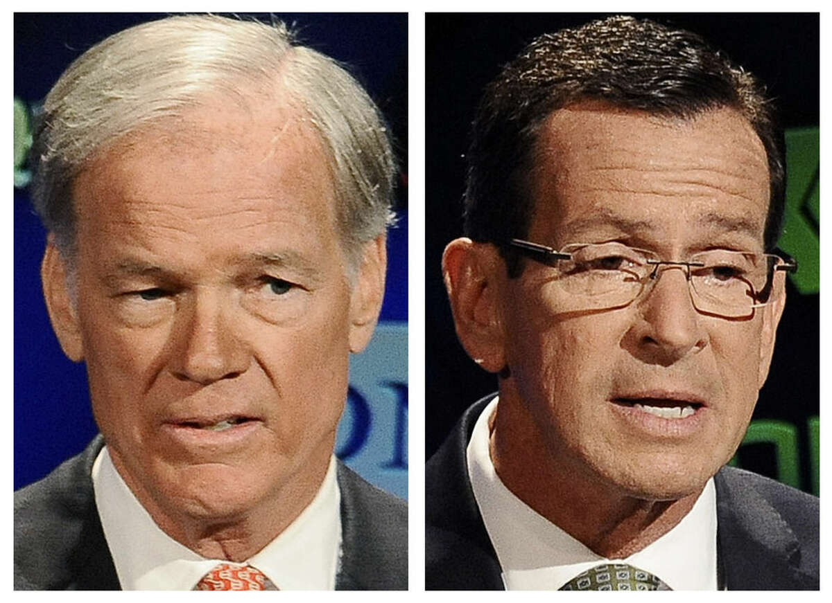 FILE - In these Oct. 2, 2014 file photos, Republican candidate for governor Tom Foley, left, and incumbent Democrat Gov. Dannel P. Malloy, right, speak during a live televised debate at the University of Connecticut in Storrs, Conn. The two men will face off in the Nov. 4 general election. (AP Photo/Jessica Hill, File)