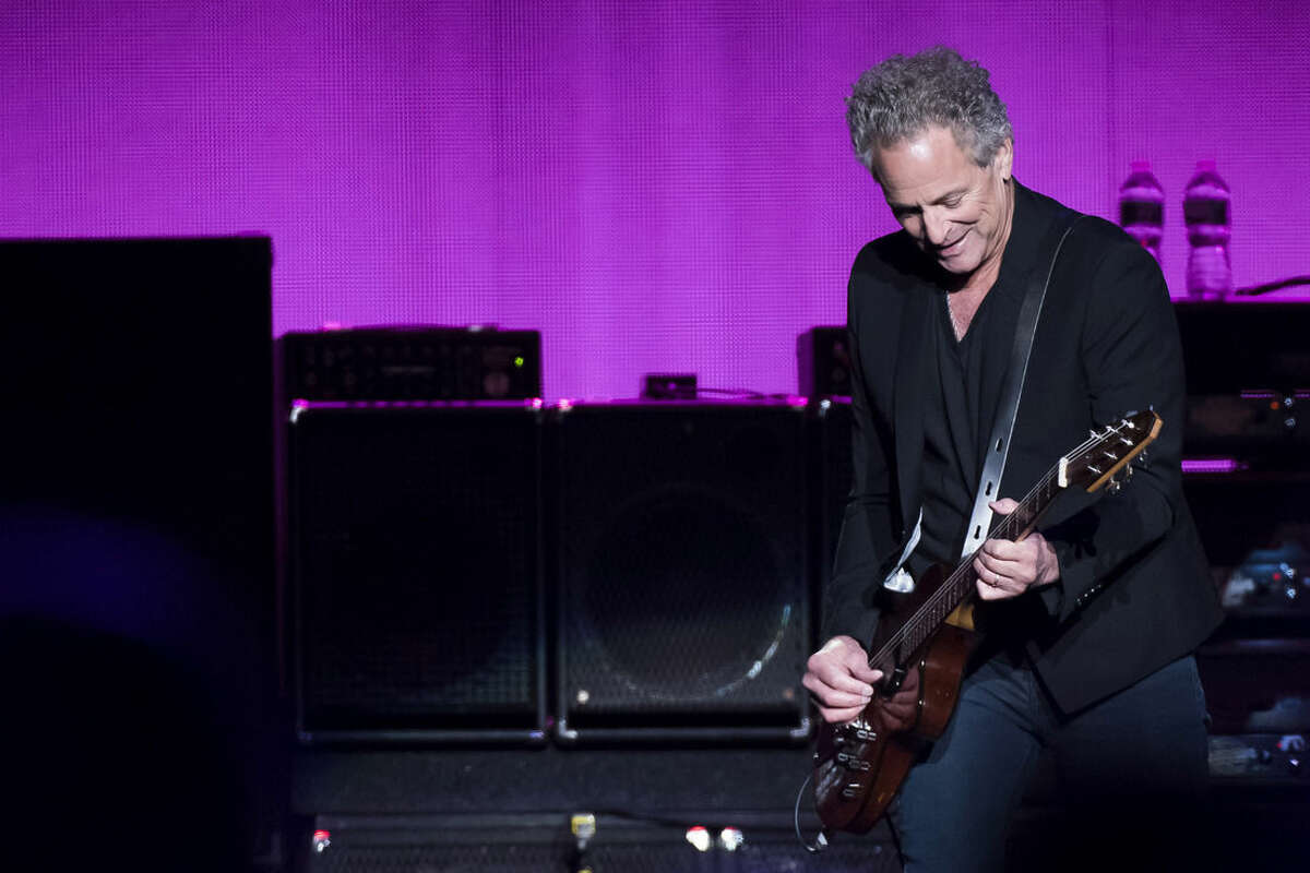 Lindsey Buckingham from the band Fleetwood Mac performs at Madison Square Garden on Monday, Oct. 6, 2014, in New York. (Photo by Charles Sykes/Invision/AP)