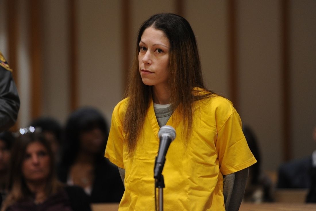 Woman pleads not guilty in death of boyfriend's parents