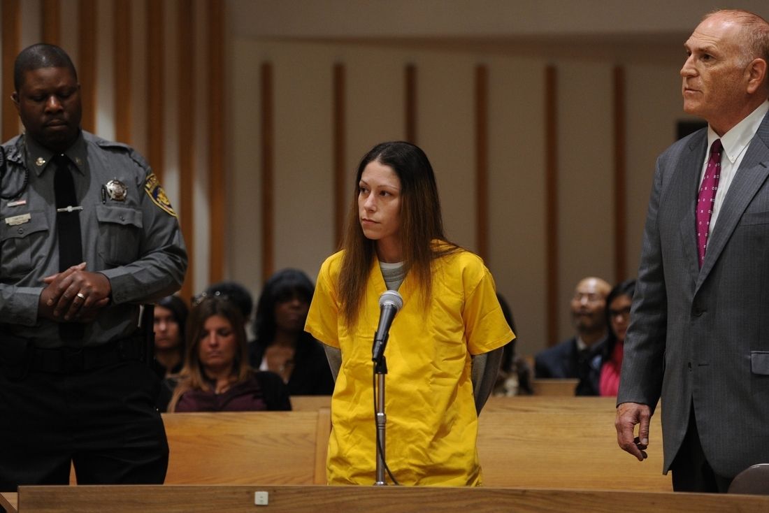 Woman pleads not guilty in death of boyfriend's parents
