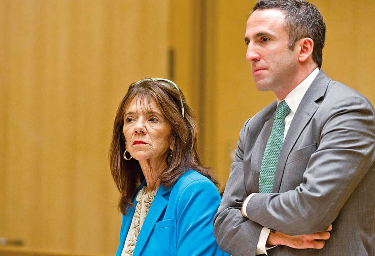 Stamford High School Principal Donna Valentine is arraigned at State Superior Court in Stamford, Conn., on Wednesday, October 8, 2014, with her attorney, Mark Sherman, for allegedly failing to report a sexual relationship between teacher Danielle Watkins and an 18-year-old student. (Pool photo/Lindsay Perry/Stamford Advocate)