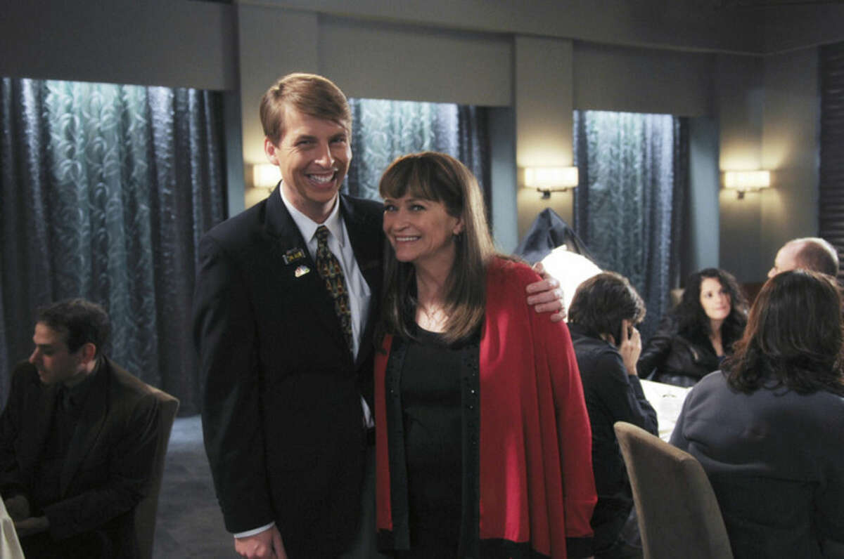 This photo provided by NBC Universal shows Jack McBrayer, left, as Kenneth, and Jan Hooks as Verna in season 4 of the television series, "30 Rock." Hooks, the former "Saturday Night Live" cast member has died. She was 57. Hooks died Thursday, Oct. 9, 2014 according to her agent Lisa Lieberman. (AP Photo/NBCU Photo Bank, Ali Goldstein)