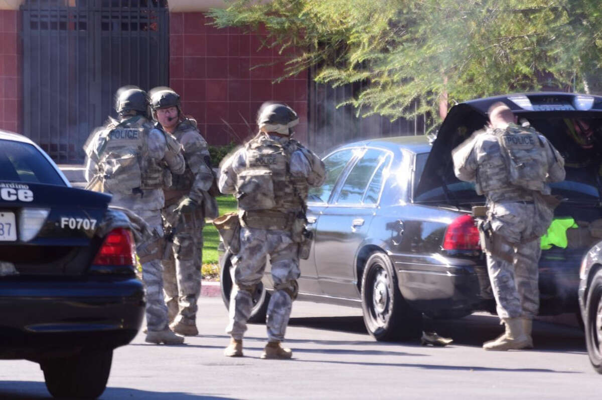 A swat team arrives at the scene of a shooting in San Bernardino, Calif. on Wednesday, Dec. 2, 2015. Police responded to reports of an active shooter at a social services facility. (Doug Saunders/Los Angeles News Group via AP) MANDATORY CREDIT