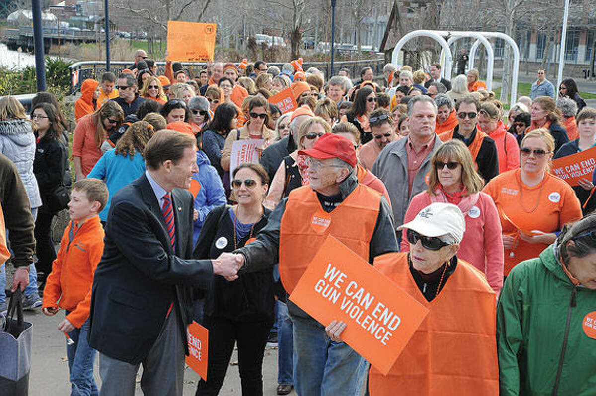 United States Senator Richard Blumenthal leads the walk Sunday at Oyster Shell Park in Norwalk where people in support of gun safety held a rally and walked against gun violence. Hour photo/Matthew Vinci