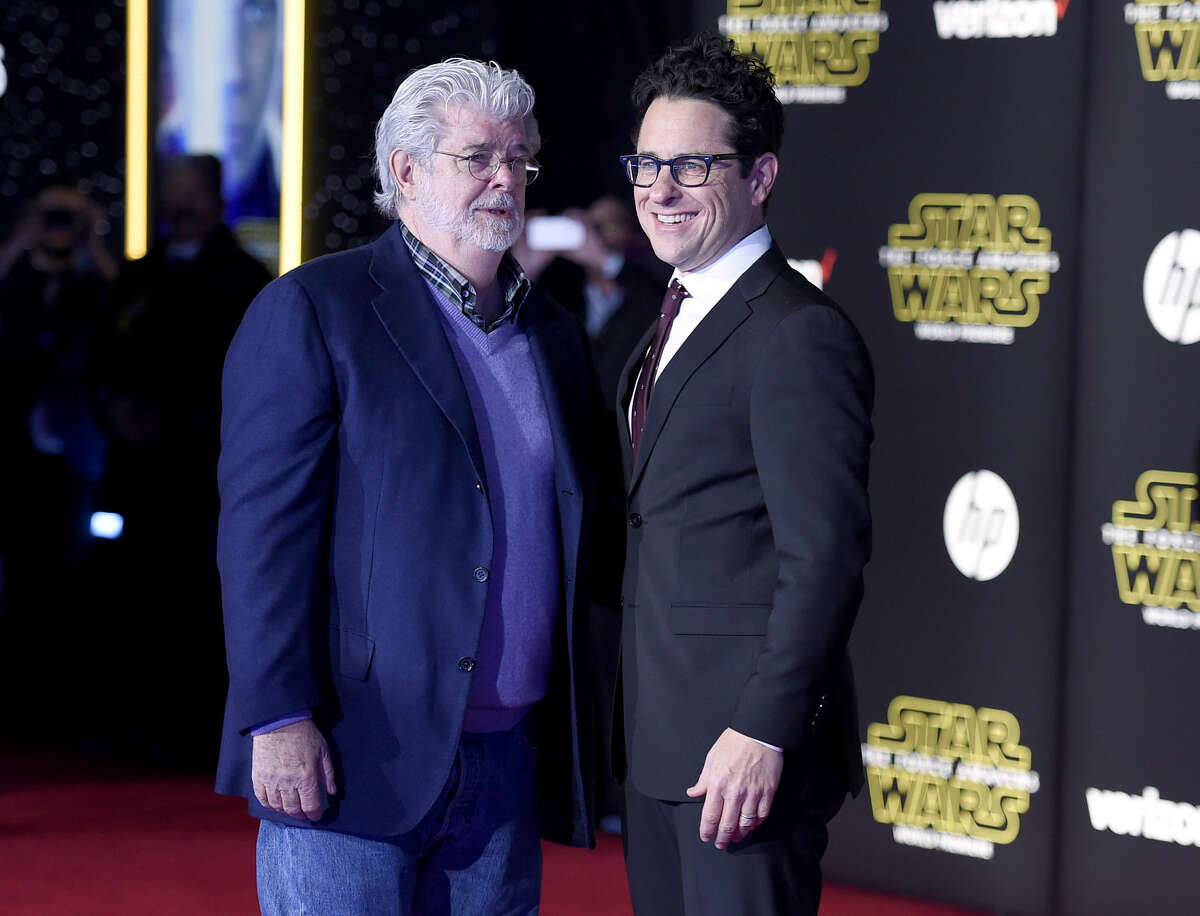 George Lucas, left, and J.J. Abrams arrive at the world premiere of "Star Wars: The Force Awakens" at the TCL Chinese Theatre on Monday, Dec. 14, 2015, in Los Angeles. (Photo by Jordan Strauss/Invision/AP)