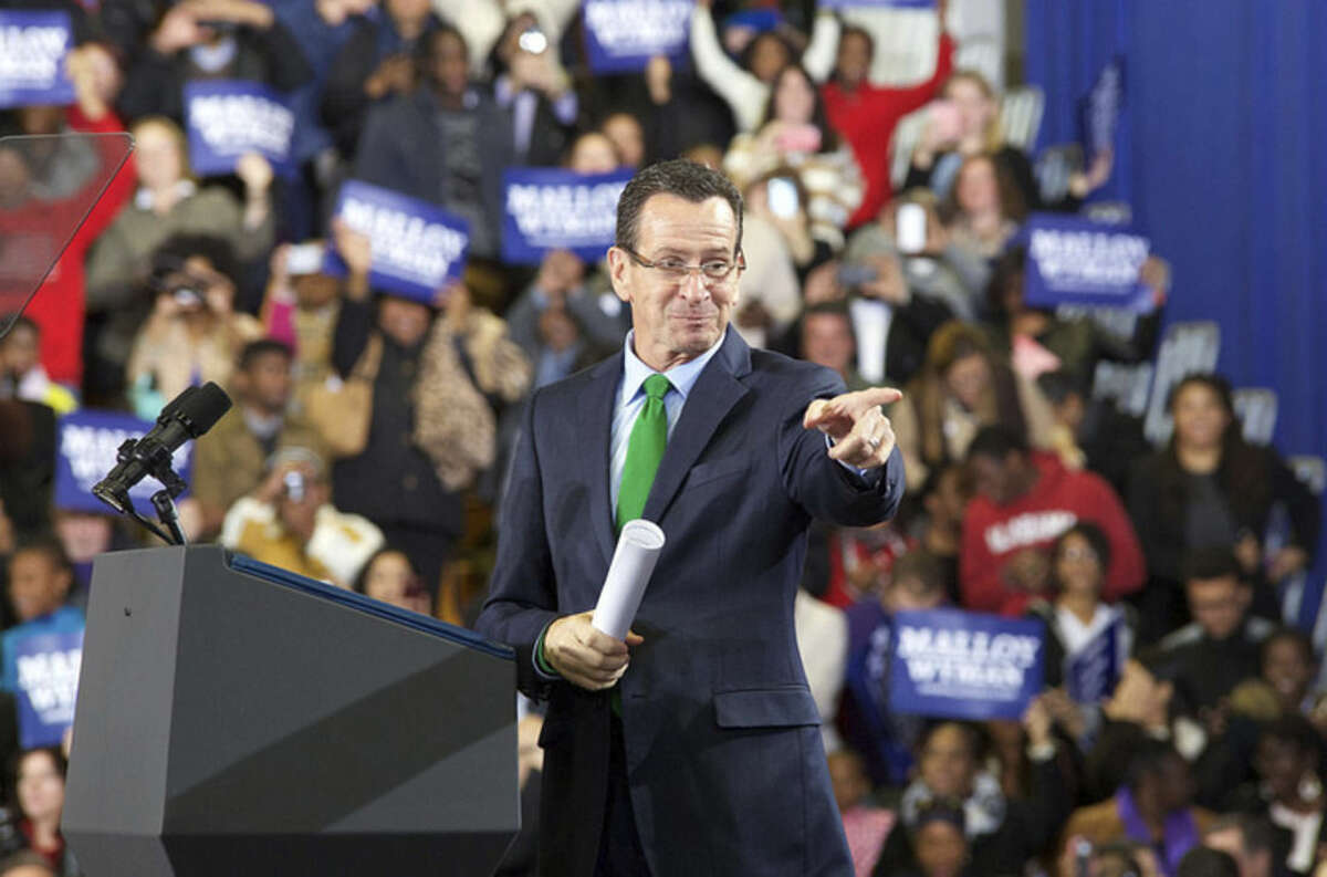 Hour photo/Danielle Calloway Gov. Dannel P. Malloy introduces President Barack Obama during a campaign rally at Central High School in Bridgeport Sunday afternoon.
