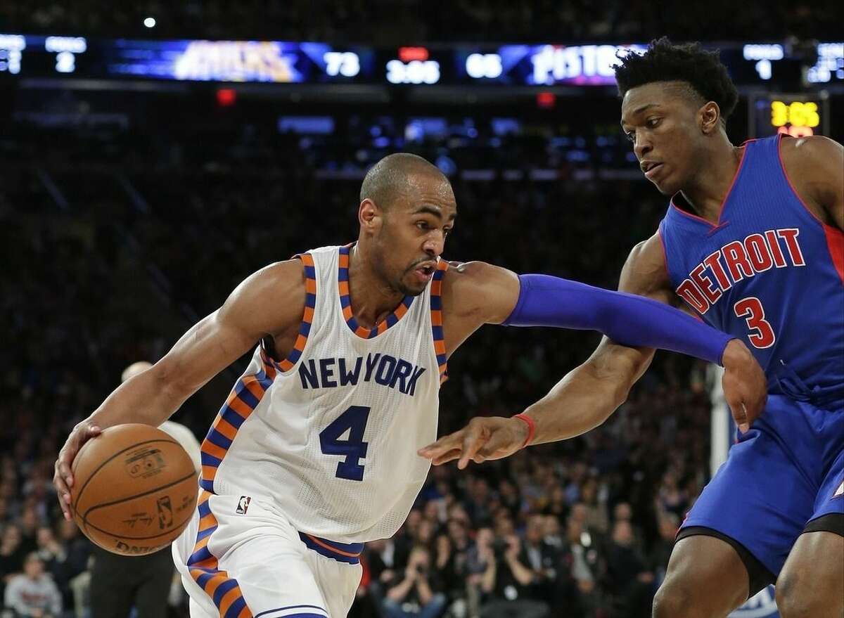 New York Knicks' Arron Afflalo (4) drives past Detroit Pistons' Stanley Johnson (3) during the second half of an NBA basketball game Tuesday, Dec. 29, 2015, in New York. The Knicks won 108-96. (AP Photo/Frank Franklin II)