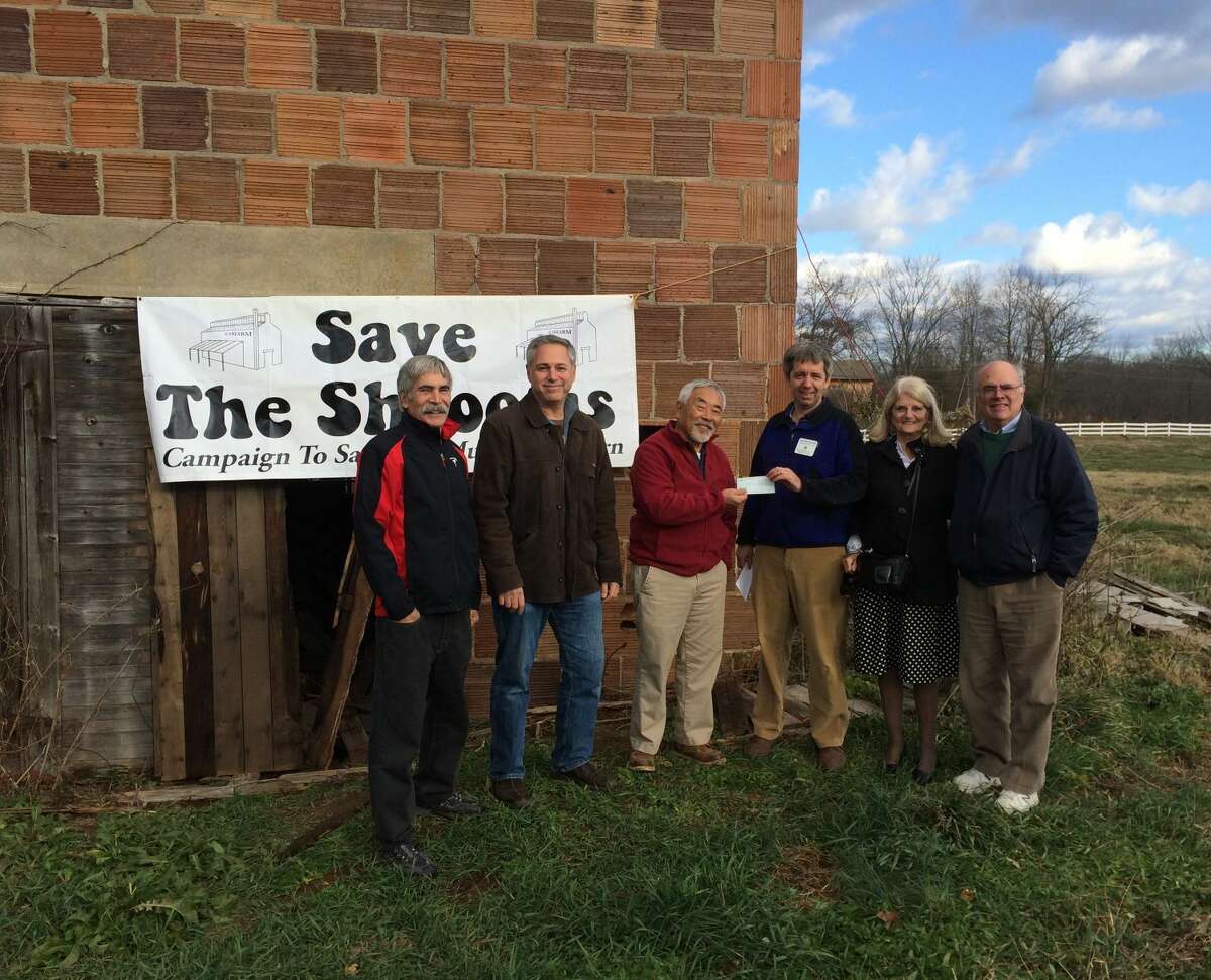 To help preserve the 100-year-old Mushroom Barn at Auerfarm, the Bloomfield Rotary donated $5,000 to the “Save the ‘Shrooms” restoration project. From left; Dale Bertoldi, Architect from Ironwood Community Partners, Mark Weisman, Board Member of the 4-H Education Center at Auerfarm and Architect from Tangible Properties, Jack Hasegawa, Executive Director of the 4-H Education Center at Auerfarm, Jonathan Hochman, President of the Bloomfield Rotary Club, Hans Kilbourn, member of the Bloomfield Rotary Club, and Norman Famely, President of the Bloomfield Rotary Club Foundation. Photo courtesy of Alliances by Alisa Media Relations.