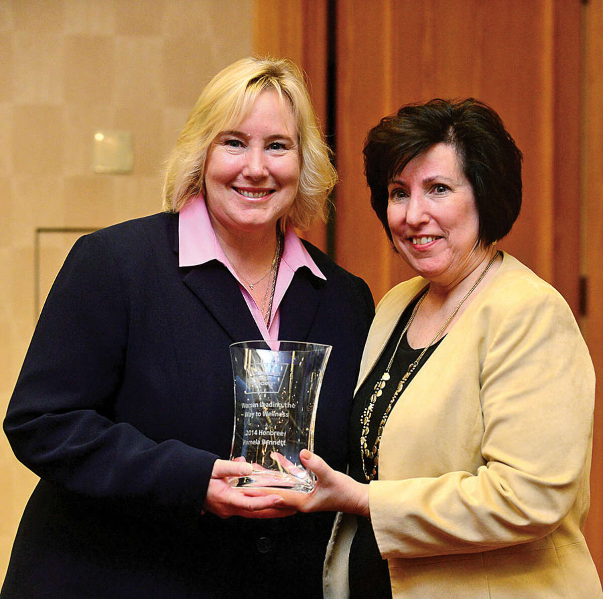 Hour photo / Erik Trautmann American Cancer Society Executive Vice President Peg Camp honors Executive Director of Patient and Professional Relations at Purdue Pharma L.P., Pamela Bennett, RN, BSN, CCE; as The American Cancer Society hosts the inaugural “Women Leading the Way to Wellness Breakfast” Wednesday morning at Dolce Norwalk. Fairfield county residents, local business and community leaders, and health professionals gathered to learn more about cancer prevention and early detection.