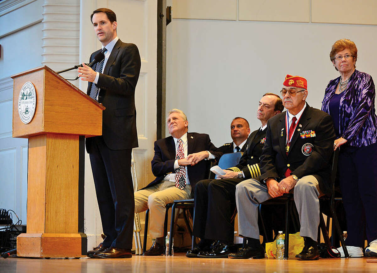 Hour photo / Erik Trautmann US Congressman Jim Himes gives his address during Norwalk Veteran's Day celebration at City Hall Tuesday morning.