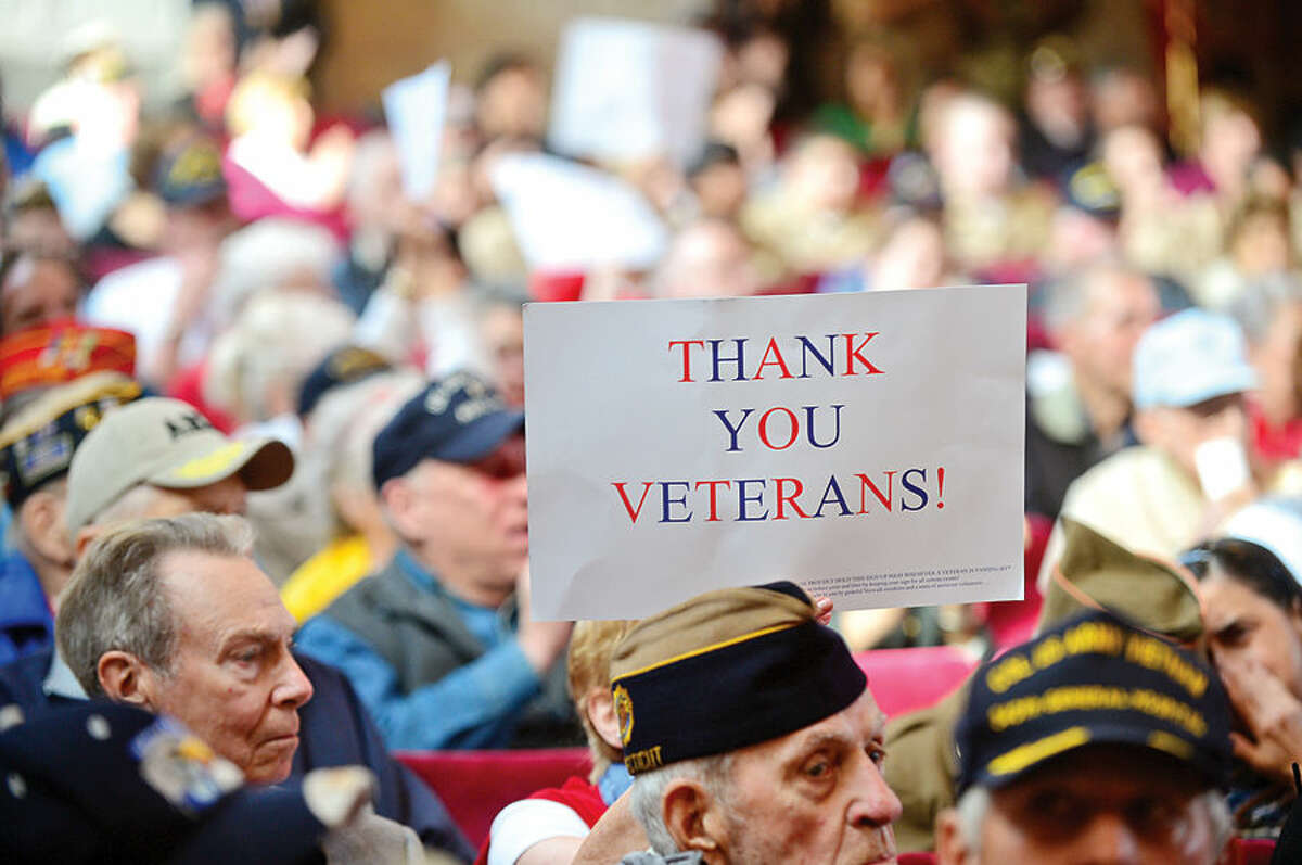 Hour photo / Erik Trautmann The crowd gathered at the Norwalk Concert Hall shows their appreciation for veterans during Norwalk Veteran's Day celebration at City Hall Tuesday morning.