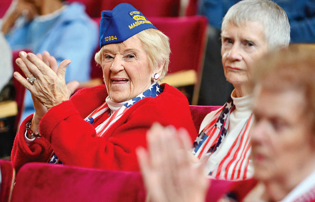 Hour photo / Erik Trautmann The Ladies Auxiliary shows their support for veterans during the Norwalk Veteran's Day celebration at City Hall Tuesday morning.