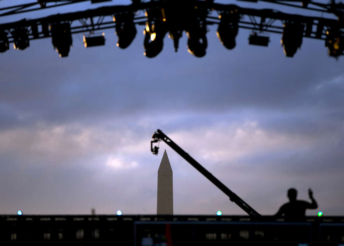The Washington Monument is photographed through the stage on the National Mall in Washington, Tuesday, Nov. 11, 2014, before the start of the Concert for Valor. The Veterans Day event is hosted by HBO, Starbucks and Chase and is free and open to the public. (AP Photo/Carolyn Kaster)