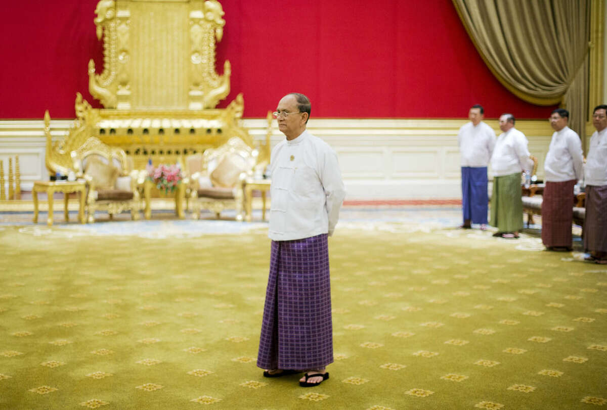 Myanmar's President Thein Sein waits to greet President Barack Obama before the start of their meeting at the Presidential Palace in Naypyitaw, Myanmar, Thursday, Nov. 13, 2014. (AP Photo/Pablo Martinez Monsivais)