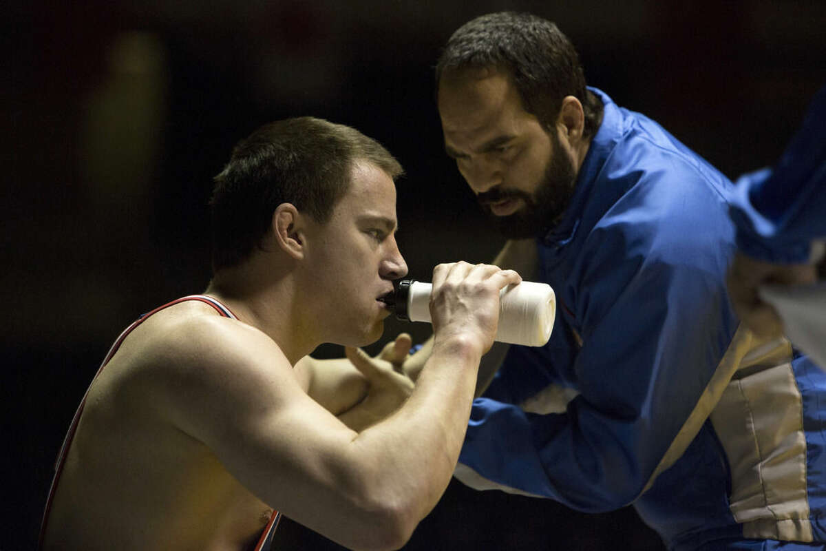 This image released by Sony Pictures Classics shows Channing Tatum, left, and Mark Ruffalo in a scene from "Foxcatcher." (AP Photo/Sony Pictures Classics, Scott Garfield)