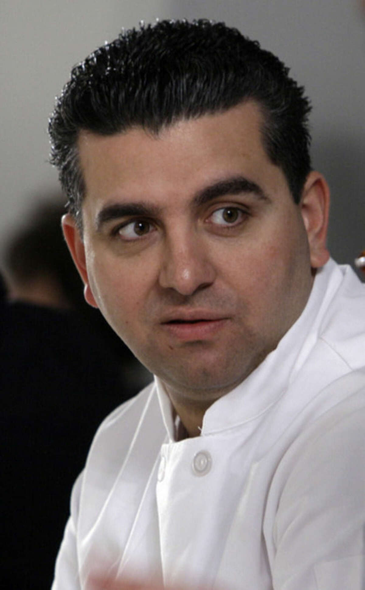 FILE - In this Feb. 17, 2011 file photo, Buddy Valastro attends the presentation of the fall 2011 collection of designer Isaac Mizrahi during Fashion Week in New York. The New York Police Department says “Cake Boss” Buddy Valastro was arrested, Thursday, Nov. 13, 2014 on a charge of Driving While Intoxicated after being pulled over for driving erratically in Manhattan. (AP Photo/Richard Drew, File)