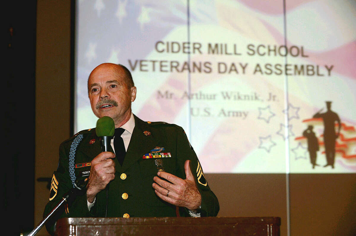 Hour photo/Erik Trautmann Wilton celebrates Veterans Day at Cider Mill School on Tuesday.