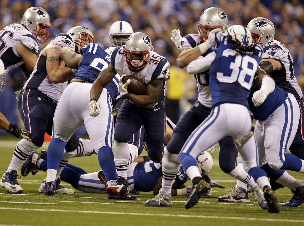 New England Patriots running back Jonas Gray runs against the Indianapolis Colts during the second half of an NFL football game in Indianapolis, Sunday, Nov. 16, 2014. (AP Photo/AJ Mast)