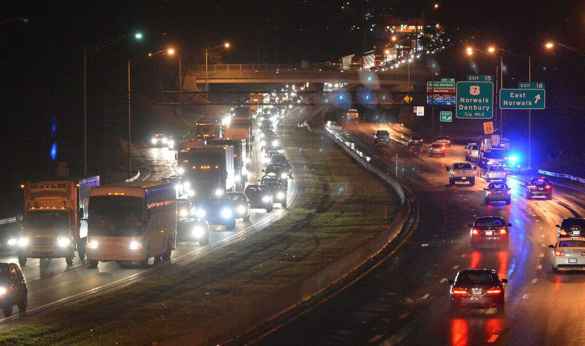 Hour Photo/Alex von Kleydorff. Traffic in both directions at a standstill on I 95 at Strawberry Hill Ave due to a water main break that flooded the southbound side