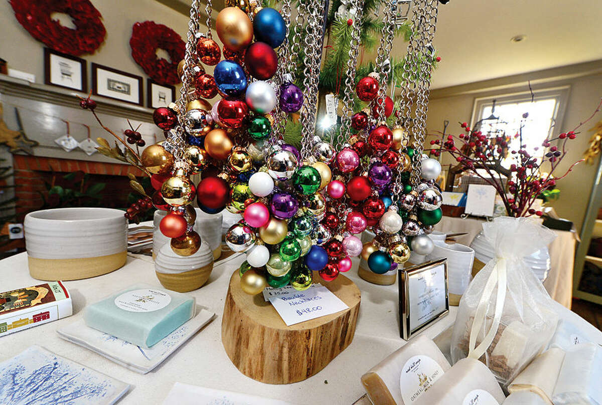 The Wilton Historical Society prepares items for its annual Holiday Trunk Show scheduled for Dec. 11-12.