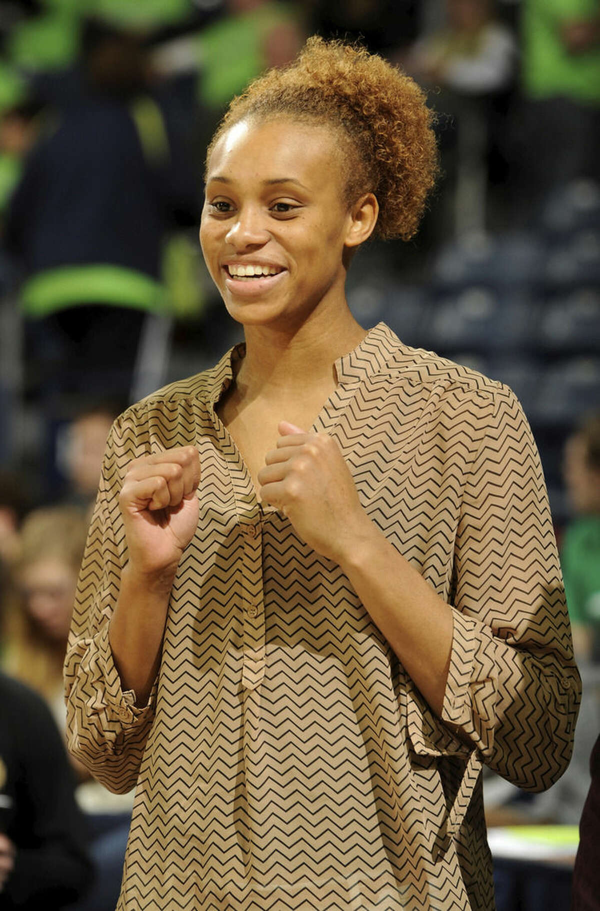 Notre Dame forward Brianna Turner stands in street clothes before an NCAA college basketball game against Connecticut, Saturday Dec. 6, 2014, in South Bend, Ind. (AP Photo/Joe Raymond)