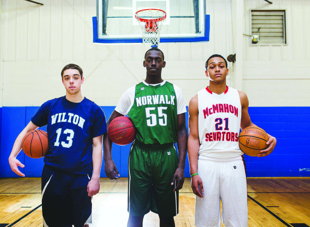 AAU teammates, from left to right, Matt Shifrin of Wilton, Roy Kane Jr of Norwalk and Timmy Hinton Jr of McMahon, are all leading players for their respective high school teams as boys high school basketball play begins across the state of Connecticut this week.