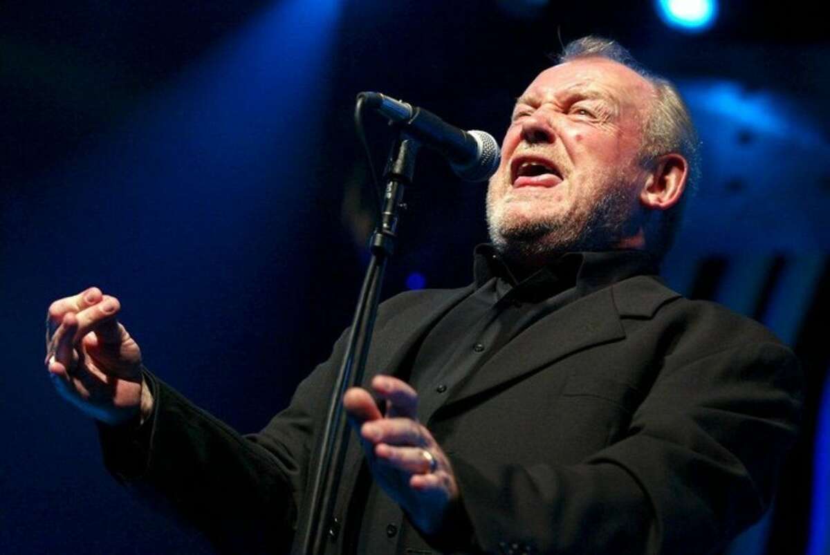 FILE - In this July 20, 2002 file photo, British Rock and Blues legend Joe Cocker performs on stage of the Stravinski hall during the Montreux Jazz Festival, in Montreux, Switzerland. Cocker, best known for the songs, "You Are So Beautiful," and the 1980s duet "Up Where We Belong," with Jennifer Warnes, died Monday, Dec. 22, 2014 of lung cancer in Colorado. He was 70. (AP Photo/Keystone, Fabrice Coffrini, File)