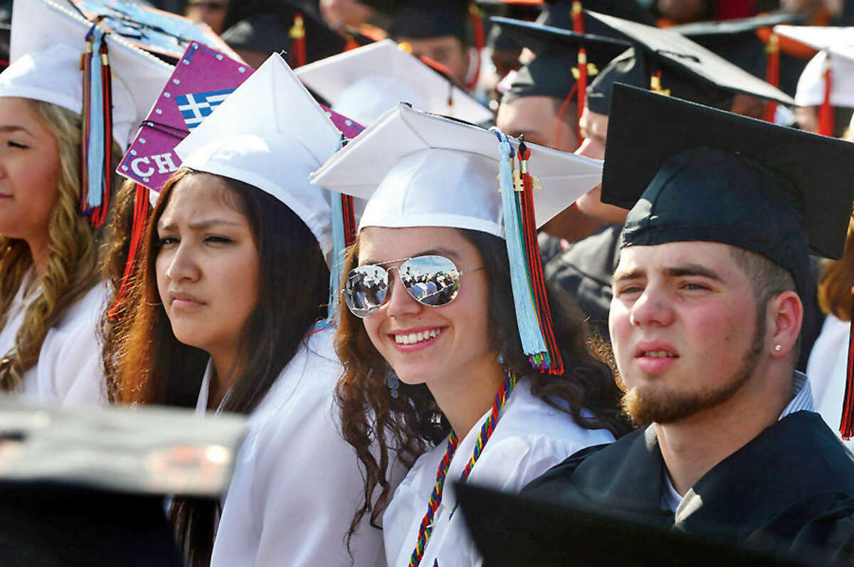 Hour photo / Erik Trautmann Stamford High School seniors celebrate the graduation of the Class of 2014 during commencement excercises Thursday afternoon at Boyle Stadium.